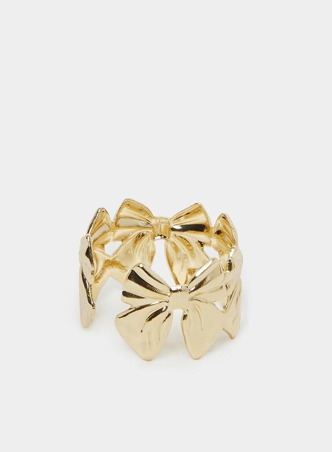 ستايلي خاتم بارز بتصميم فيونكة ذهبية - Image 1